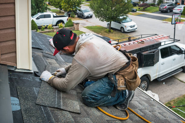 Professional Flat Roof Repair technician working in Huston, ID